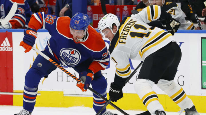 Edmonton Oilers forward Leon Draisaitl (29) and Boston Bruins forward Trent Fredcric (11) Mandatory Credit: Perry Nelson-USA TODAY Sports