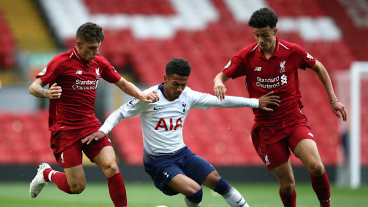 LIVERPOOL, ENGLAND - AUGUST 17: Marcus Edwards of Tottenham Hotspur battles with Adam Lewis and Curtis Jones of Liverpool during the Premier League 2 match between Liverpool at Tottenham Hotspur at Anfield on August 17, 2018 in Liverpool, England. (Photo by Jan Kruger/Getty Images)