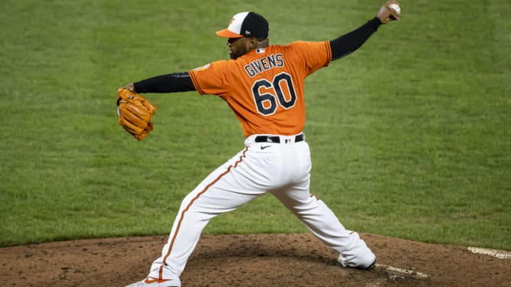 BALTIMORE, MD - AUGUST 22: Mychal Givens #60 of the Baltimore Orioles pitches against the Boston Red Sox during the seventh inning at Oriole Park at Camden Yards on August 22, 2020 in Baltimore, Maryland. (Photo by Scott Taetsch/Getty Images)