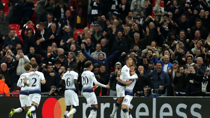 LONDON, ENGLAND - NOVEMBER 06: Harry Kane of Tottenham Hotspur celebrates with team mates Erik Lamela, Dele Alli, Davinson Sanchez and Kieran Trippier after scoring his team's second goal during the Group B match of the UEFA Champions League between Tottenham Hotspur and PSV at Wembley Stadium on November 6, 2018 in London, United Kingdom. (Photo by Richard Heathcote/Getty Images)