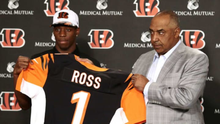 Apr 28, 2017; Cincinnati, OH, USA; Cincinnati Bengals first round draft pick John Ross holds up his No. 1 jersey with head coach Marvin Lewis in a press conference at Paul Brown Stadium. Mandatory Credit: Sam Greene/Cincinnati Enquirer via USA TODAY NETWORK