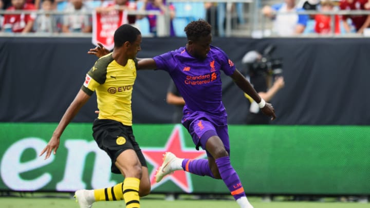 CHARLOTTE, NC - JULY 22: (THE SUN OUT, THE SUN ON SUNDAY OUT) Divock Origi of Liverpool competes with Abdou Diallo of Borussia Dortmund during the International Champions Cup 2018 match between Liverpool and Borussia Dortmund at Bank of America Stadium on July 22, 2018 in Charlotte, North Carolina. (Photo by Andrew Powell/Liverpool FC via Getty Images)
