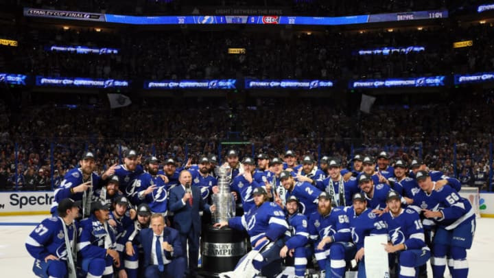 The Tampa Bay Lightning pose with the Stanley Cup. (Photo by Bruce Bennett/Getty Images)
