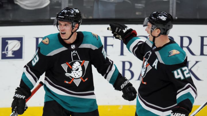 ANAHEIM, CA - OCTOBER 08: Anaheim Ducks rightwing Jakob Silfverberg (33) and defenseman Josh Manson (42) react after Silfverberg scored a goal in the third period of a game against the Detroit Red Wings played on October 8, 2018 at the Honda Center in Anaheim, CA. (Photo by John Cordes/Icon Sportswire via Getty Images)