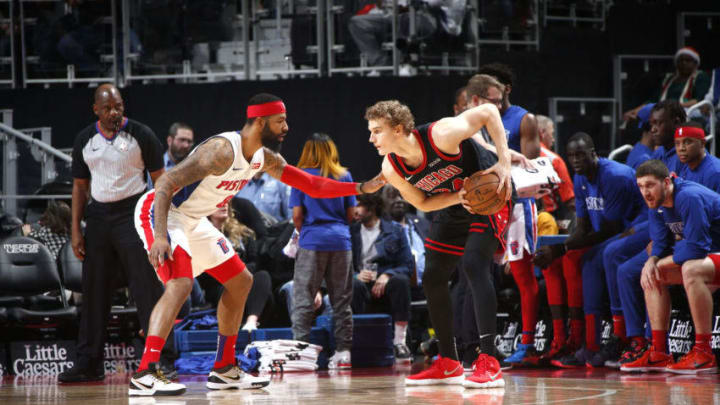 DETROIT, MI - DECEMBER 21: Lauri Markkanen #24 of the Chicago Bulls handles the ball against Markieff Morris #8 of the Detroit Pistons on December 21, 2019 at Little Caesars Arena in Detroit, Michigan. NOTE TO USER: User expressly acknowledges and agrees that, by downloading and/or using this photograph, User is consenting to the terms and conditions of the Getty Images License Agreement. Mandatory Copyright Notice: Copyright 2019 NBAE (Photo by Brian Sevald/NBAE via Getty Images)