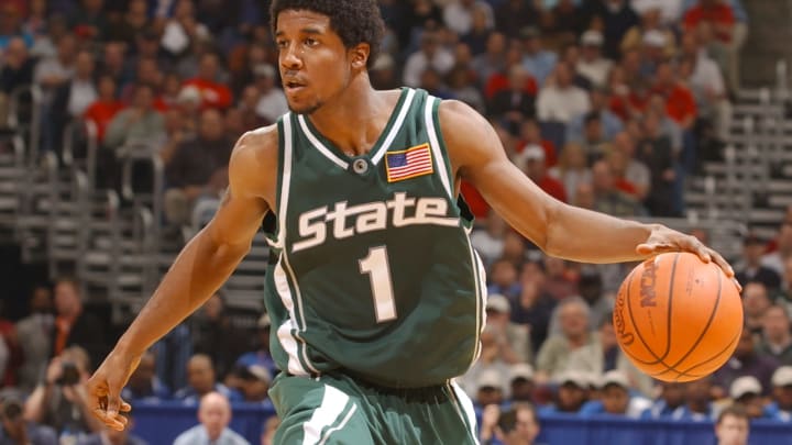 WASHINGTON, DC – MARCH 16: Marcus Taylor #1 of the Michigan State Spartans dribbles the ball during the NCAA College Basketball Tournament 1st round game against the North Carolina Wolfpack at the MCI Center on March 16, 2002 in Washington, DC. The Wolfpack won 69-58. (Photo by Mitchell Layton/Getty Images)
