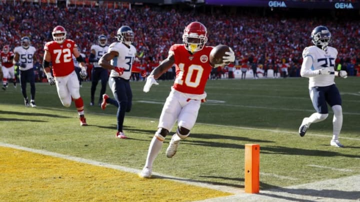 KANSAS CITY, MO - JANUARY 19: Tyreek Hill #10 of the Kansas City Chiefs runs the ball into the end zone for a touchdown during the AFC Championship game against the Tennessee Titans at Arrowhead Stadium on January 19, 2020 in Kansas City, Missouri. The Chiefs defeated the Titans 35-24. (Photo by Joe Robbins/Getty Images)