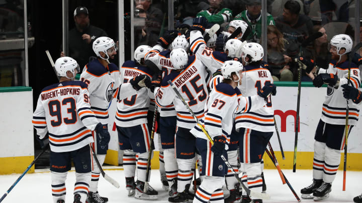 DALLAS, TEXAS – MARCH 03: The Edmonton Oilers celebrate a 2-1 win in overtime against the Dallas Stars at American Airlines Center on March 03, 2020 in Dallas, Texas. (Photo by Ronald Martinez/Getty Images)