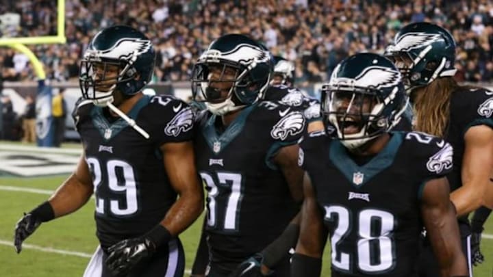 Oct 12, 2014; Philadelphia, PA, USA; Philadelphia Eagles strong safety Nate Allen (29) and cornerback Jaylen Watkins (37) and free safety Earl Wolff (28) walk back to the bench after a defensive stop against the New York Giants at Lincoln Financial Field. The Eagles defeated the Giants 27-0. Mandatory Credit: Bill Streicher-USA TODAY Sports Oct 12, 2014; Philadelphia, PA, USA; Philadelphia Eagles strong safety Nate Allen (29) and cornerback Jaylen Watkins (37) and free safety Earl Wolff (28) walk back to the bench after a defensive stop against the New York Giants at Lincoln Financial Field. The Eagles defeated the Giants 27-0. Mandatory Credit: Bill Streicher-USA TODAY Sports