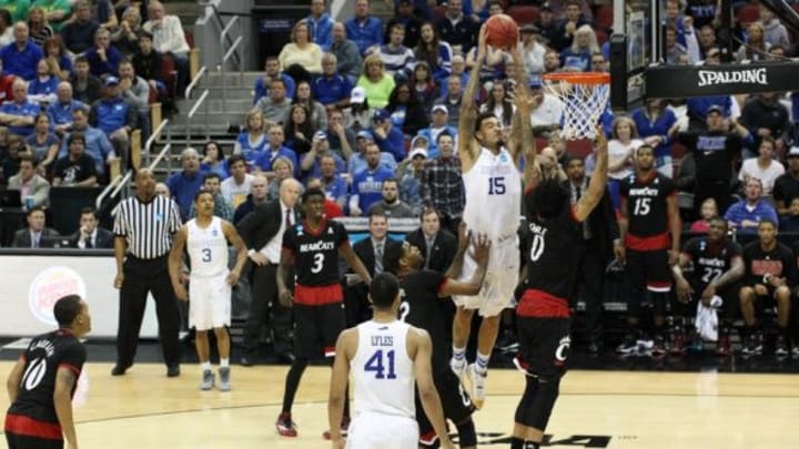 Mar 21, 2015; Louisville, KY, USA; Kentucky Wildcats forward Willie Cauley-Stein (15) dunks the ball against Cincinnati Bearcats forward Quadri Moore (0) during the first half in the third round of the 2015 NCAA Tournament at KFC Yum! Center. Mandatory Credit: Brian Spurlock-USA TODAY Sports