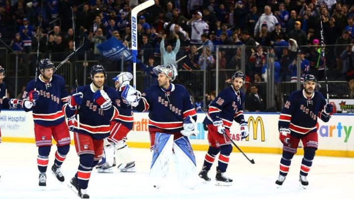 Feb 21, 2016; New York, NY, USA; The New York Rangers salute their fans after defeating the Detroit Red Wings in overtime at Madison Square Garden. The Rangers defeated the Red Wings 1-0. Mandatory Credit: Andy Marlin-USA TODAY Sports