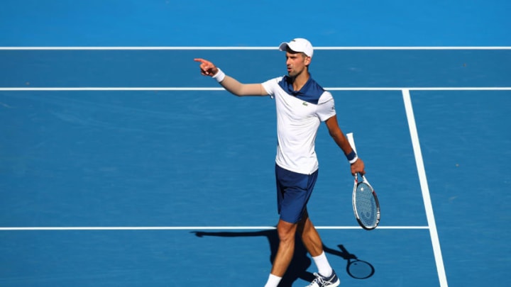 MELBOURNE, AUSTRALIA - JANUARY 18: Novak Djokovic of Serbia reacts in his second round match against Gael Monfils of France on day four of the 2018 Australian Open at Melbourne Park on January 18, 2018 in Melbourne, Australia. (Photo by Cameron Spencer/Getty Images)