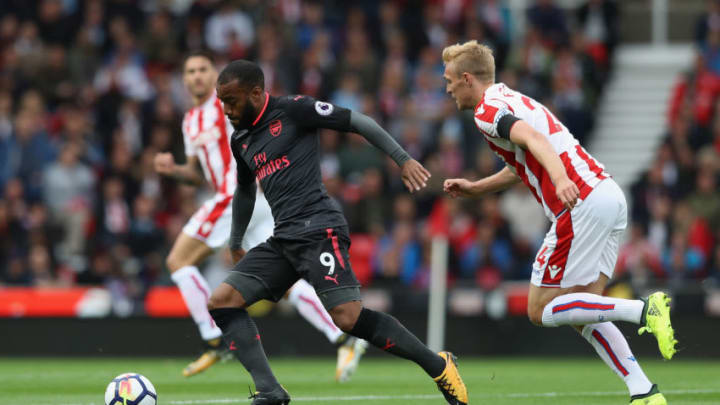 STOKE ON TRENT, ENGLAND - AUGUST 19: Alexandre Lacazette of Arsenal moves away from Darren Fletcher during the Premier League match between Stoke City and Arsenal at Bet365 Stadium on August 19, 2017 in Stoke on Trent, England. (Photo by David Rogers/Getty Images)