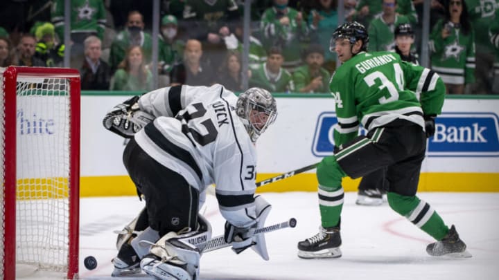 Oct 22, 2021; Dallas, Texas, USA; Los Angeles Kings goaltender Jonathan Quick (32) and Dallas Stars right wing Denis Gurianov (34) in action during the game between the Dallas Stars and the Los Angeles Kings at the American Airlines Center. Mandatory Credit: Jerome Miron-USA TODAY Sports