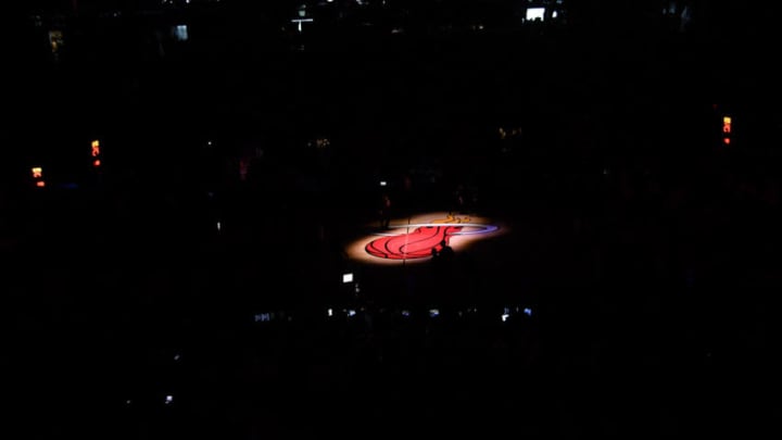 MIAMI, FL - APRIL 21: A spotlight view of the Miami Heat logo during introductions before Game Four of Round One of the 2018 NBA Playoffs between the Miami Heat and the Philadelphia 76ers at American Airlines Arena on April 21, 2018 in Miami, Florida. NOTE TO USER: User expressly acknowledges and agrees that, by downloading and or using this photograph, User is consenting to the terms and conditions of the Getty Images License Agreement. (Photo by Mark Brown/Getty Images) *** Local Caption ***