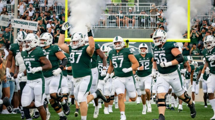 EAST LANSING, MI - SEPTEMBER 02: The Michigan State University Spartans take the field prior to the game against Western Michigan Broncos at Spartan Stadium on September 2, 2022 in East Lansing, Michigan. (Photo by Jaime Crawford/Getty Images)