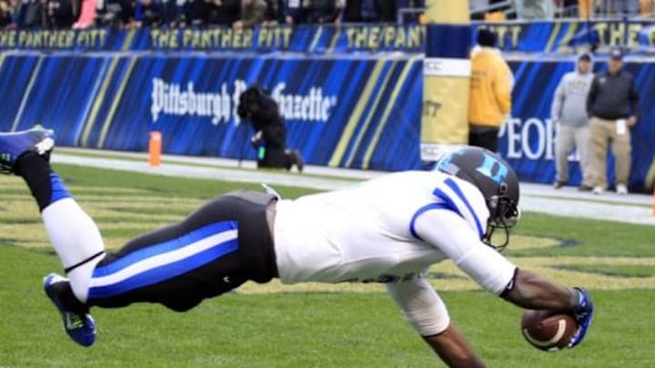 Nov 1, 2014; Pittsburgh, PA, USA; Duke Blue Devils wide receiver Jamison Crowder (3) dives into the endzone to score a touchdown against the Pittsburgh Panthers during the second quarter at Heinz Field. Mandatory Credit: Charles LeClaire-USA TODAY Sports