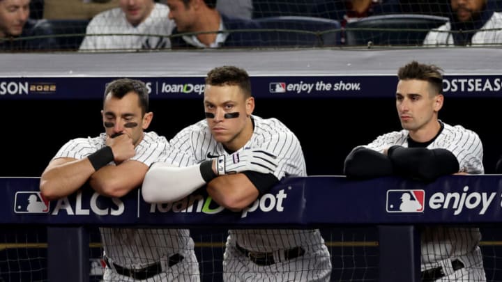NEW YORK, NEW YORK - OCTOBER 22: Aaron Judge #99 of the New York Yankees looks on from the dugout during the fifth inning against the Houston Astros in game three of the American League Championship Series at Yankee Stadium on October 22, 2022 in New York City. (Photo by Jamie Squire/Getty Images)
