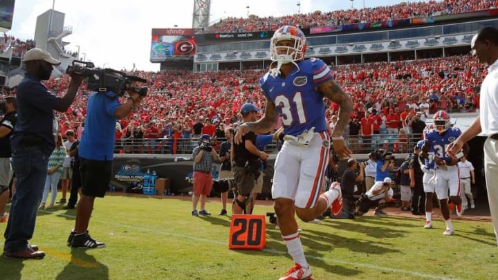 Oct 29, 2016; Jacksonville, FL, USA; Florida Gators defensive back Teez Tabor (31) and teammates run out of the tunnel before the game against the Georgia Bulldogs at EverBank Field. Mandatory Credit: Kim Klement-USA TODAY Sports