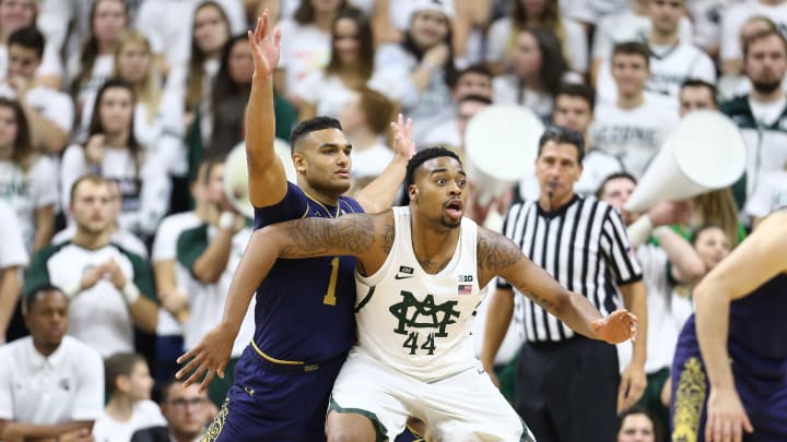 EAST LANSING, MI – NOVEMBER 30: Nick Ward #44 of the Michigan State Spartans posts up against Austin Torres #1 of the Notre Dame Fighting Irish during the game at Breslin Center on November 30, 2017 in East Lansing, Michigan. (Photo by Rey Del Rio/Getty Images)