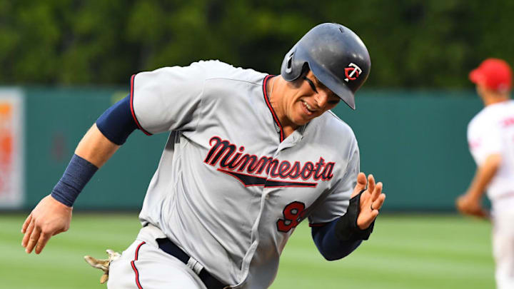 ANAHEIM, CA - MAY 12: Logan Morrison #99 of the Minnesota Twins rounds third base to score a run on a single by Joe Mauer #7 of the Minnesota Twins in the third inning of the game against the Los Angeles Angels of Anaheim at Angel Stadium on May 12, 2018 in Anaheim, California. (Photo by Jayne Kamin-Oncea/Getty Images)