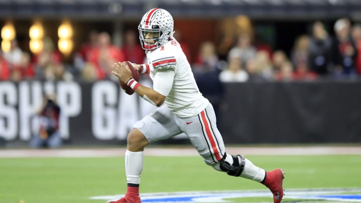 INDIANAPOLIS, INDIANA – DECEMBER 07: Justin Fields #1 of the Ohio State Buckeyes runs with the ball in the BIG Ten Football Championship Game against the Wisconsin Badgers at Lucas Oil Stadium on December 07, 2019 in Indianapolis, Indiana. (Photo by Andy Lyons/Getty Images)