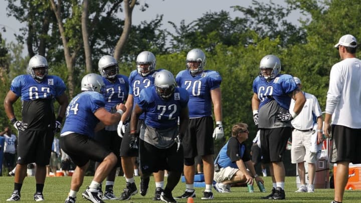 ALLEN PARK, MI - AUGUST 01: Johnny Culbreath #72 and Dan Gerberry #64 of the Detroit Lions go through their daily practice session at the Lions training facility on August 1, 2011 in Allen Park, Michigan. (Photo by Leon Halip/Getty Images) ALLEN PARK, MI - AUGUST 01: Johnny Culbreath #72 and Dan Gerberry #64 of the Detroit Lions go through their daily practice session at the Lions training facility on August 1, 2011 in Allen Park, Michigan. (Photo by Leon Halip/Getty Images)