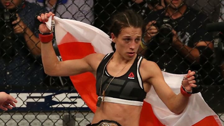 LAS VEGAS, NV - JULY 08: Joanna Jedrzejczyk of Poland celebrates after the conclusion of her UFC women's strawweight championship bout against Claudia Gadelha during The Ultimate Fighter Finale event at MGM Grand Garden Arena on July 8, 2016 in Las Vegas, Nevada. (Photo by Ed Mulholland/Zuffa LLC/Zuffa LLC via Getty Images)