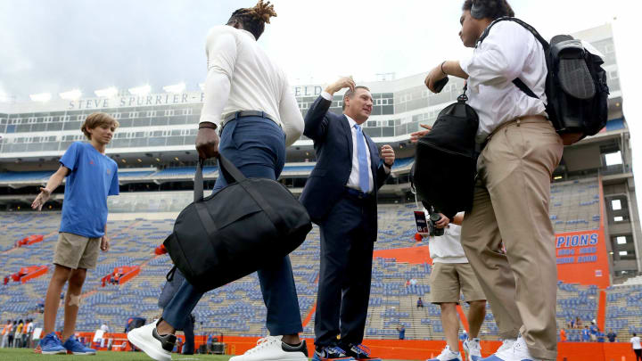 Florida Gators head coach Dan Mullen greets the team as they enter the stadium during Gator Walk before the football game between the Florida Gators and Tennessee Volunteers, at Ben Hill Griffin Stadium in Gainesville, Fla. Sept. 25, 2021.Flgai 092521 Ufvs Tennesseefb 10