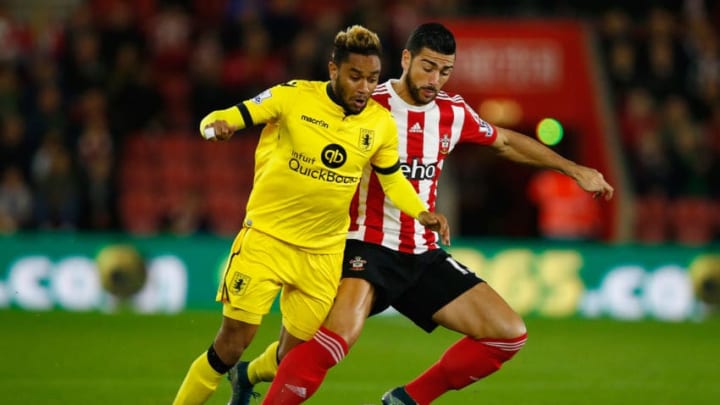 SOUTHAMPTON, ENGLAND - OCTOBER 28: Jordan Amavi of Aston Villa is challenged by Graziano Pelle of Southampton during the Capital One Cup Fourth Round match between Southampton v Aston Villa at St Mary's Stadium on October 28, 2015 in Southampton, England. (Photo by Mike Hewitt/Getty Images)