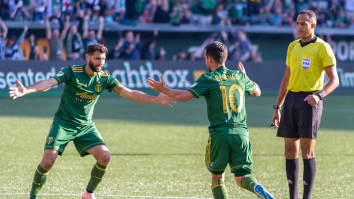 PORTLAND, OR - OCTOBER 21, 2018: Argentine players Diego Valeri and Sebastián Blanco of the Portland Timbers celebrate a goal during the Portland Timbers 3-0 victory over Real Salt lake on October 21, 2018, at Providence Park in Portland, Oregon. (Photo by Diego Diaz/Icon Sportswire via Getty Images).