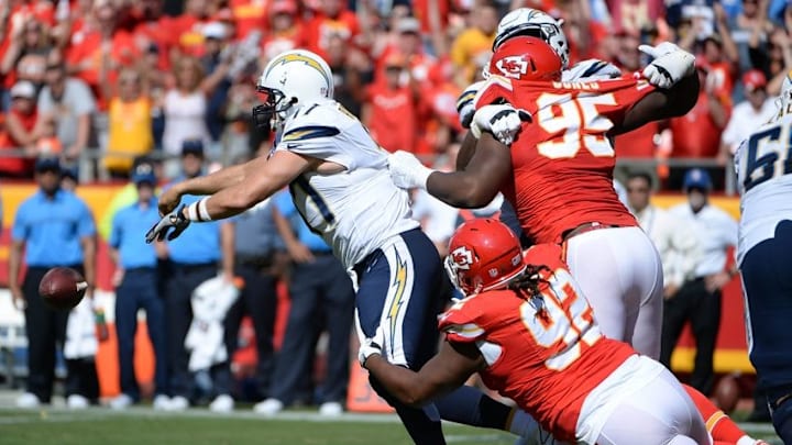 Sep 11, 2016; Kansas City, MO, USA; San Diego Chargers quarterback Philip Rivers (17) is pressured by Kansas City Chiefs defensive lineman Dontari Poe (92) and defensive lineman Chris Jones (95) at Arrowhead Stadium. Kansas City won 33-27. Mandatory Credit: John Rieger-USA TODAY Sports