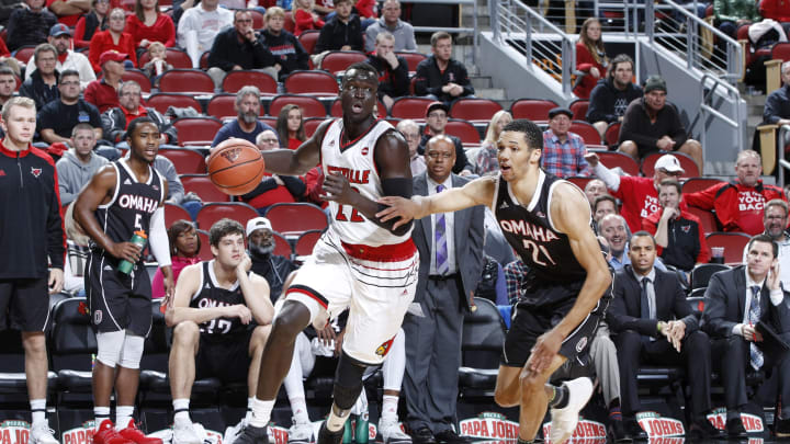 LOUISVILLE, KY – NOVEMBER 17: Deng Adel #22 of the Louisville Cardinals handles the ball against Zach Jackson #21 of the Omaha Mavericks during a game at KFC YUM! Center on November 17, 2017 in Louisville, Kentucky. Louisville won 87-78. (Photo by Joe Robbins/Getty Images)