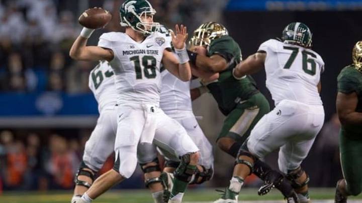 Jan 1, 2015; Arlington, TX, USA; Michigan State Spartans quarterback Connor Cook (18) passes against the Baylor Bears during the first half in the 2015 Cotton Bowl Classic at AT&T Stadium. Mandatory Credit: Jerome Miron-USA TODAY Sports