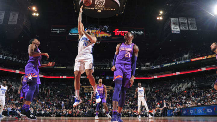 PHOENIX, AZ - NOVEMBER 30: Evan Fournier #10 of the Orlando Magic goes to the basket against the Phoenix Suns on November 30, 2018 at Talking Stick Resort Arena in Phoenix, Arizona. NOTE TO USER: User expressly acknowledges and agrees that, by downloading and/or using this photograph, user is consenting to the terms and conditions of the Getty Images License Agreement. Mandatory Copyright Notice: Copyright 2018 NBAE (Photo by Barry Gossage/NBAE via Getty Images)