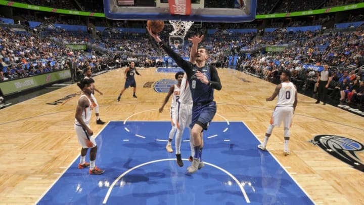 ORLANDO, FL - MARCH 24: Mario Hezonja #8 of the Orlando Magic goes to the basket against the Phoenix Suns on March 24, 2018 at Amway Center in Orlando, Florida. NOTE TO USER: User expressly acknowledges and agrees that, by downloading and/or using this photograph, user is consenting to the terms and conditions of the Getty Images License Agreement. Mandatory Copyright Notice: Copyright 2018 NBAE (Photo by Fernando Medina/NBAE via Getty Images)