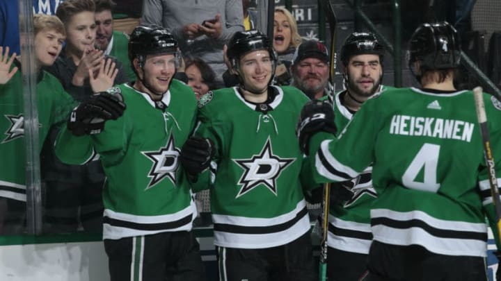 DALLAS, TX - DECEMBER 29: Radek Faksa #12, Tyler Pitlick #18, Roman Polak #45, Miro Heiskanen #4 and the Dallas Stars celebrate a goal against the Detroit Red Wings at the American Airlines Center on December 29, 2018 in Dallas, Texas. (Photo by Glenn James/NHLI via Getty Images)