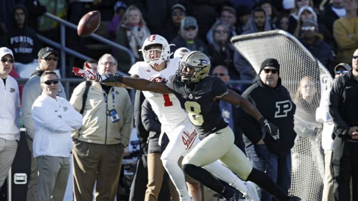 WEST LAFAYETTE, IN - NOVEMBER 25: Josh Okonye #8 of the Purdue Boilermakers defends a pass against Simmie Cobbs Jr. #1 of the Indiana Hoosiers in the fourth quarter of a game at Ross-Ade Stadium on November 25, 2017 in West Lafayette, Indiana. Purdue defeated Indiana 31-24. (Photo by Joe Robbins/Getty Images)