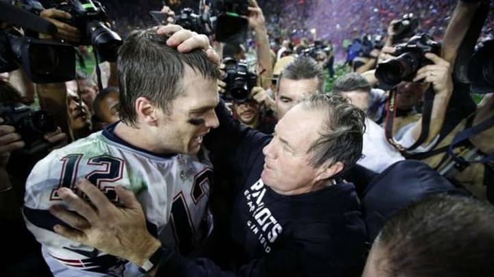 Feb 1, 2015; Glendale, AZ, USA; New England Patriots head coach Bill Belichick (right) celebrates with quarterback Tom Brady (12) after defeating the Seattle Seahawks in Super Bowl XLIX at University of Phoenix Stadium. Mandatory Credit: Mark J. Rebilas-USA TODAY Sports