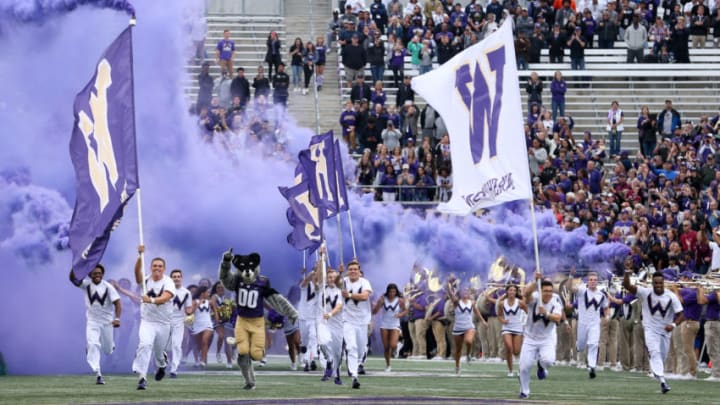 SEATTLE, WA – SEPTEMBER 9: Washington cheer members lead the Washington Huskies out onto the field during the game between the Washington Huskies and the Montana Grizzlies on September 09, 2017 at Husky Stadium in Seattle, WA. Washington won 63-7 over Montana. (Photo by Jesse Beals/Icon Sportswire via Getty Images)