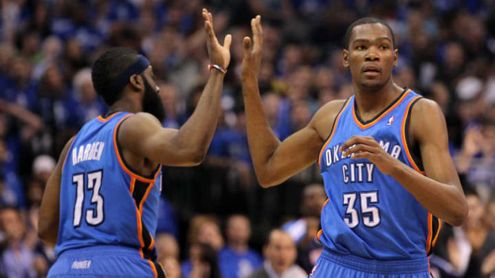 DALLAS, TX - MAY 19: (R) Kevin Durant #35 of the Oklahoma City Thunder gives a five to teammate James Harden #13 in the second half while taking on the Dallas Mavericks in Game Two of the Western Conference Finals during the 2011 NBA Playoffs at American Airlines Center on May 19, 2011 in Dallas, Texas. NOTE TO USER: User expressly acknowledges and agrees that, by downloading and or using this photograph, User is consenting to the terms and conditions of the Getty Images License Agreement. (Photo by Ronald Martinez/Getty Images)