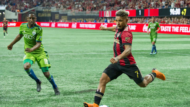 ATLANTA, GA - JULY 15: Josef Martinez #7 of Atlanta United takes a shot in front of Kelvin Leerdam #18 of Seattle Sounders FC 2 during the game at Mercedes-Benz Stadium on July 15, 2018 in Atlanta, Georgia. (Photo by Michael Chang/Getty Images)