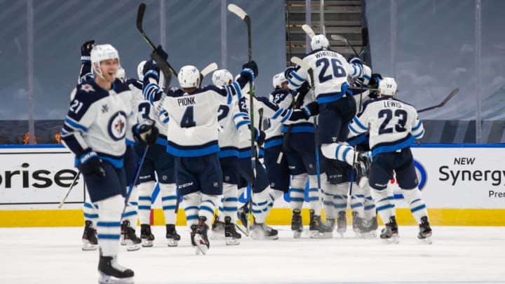 EDMONTON, AB - MAY 21: The Winnipeg Jets celebrate victory over the Edmonton Oilers during Game Two of the First Round of the 2021 Stanley Cup Playoffs at Rogers Place on May 21, 2021 in Edmonton, Canada. (Photo by Codie McLachlan/Getty Images)