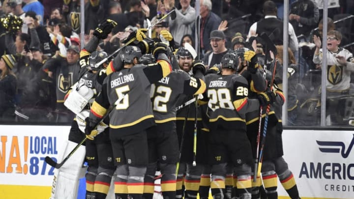 LAS VEGAS, NEVADA - JANUARY 04: The Vegas Golden Knights celebrate after the game-winning goal by Chandler Stephenson #20 in overtime against the St. Louis Blues at T-Mobile Arena on January 04, 2020 in Las Vegas, Nevada. (Photo by Jeff Bottari/NHLI via Getty Images)