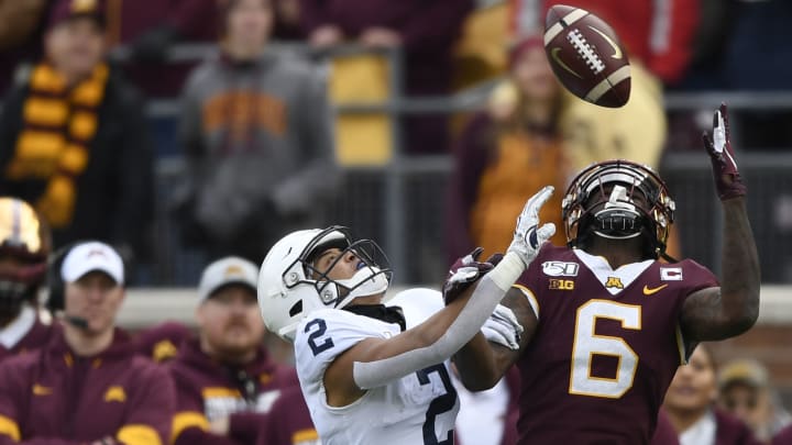 MINNEAPOLIS, MINNESOTA – NOVEMBER 09: Wide receiver Tyler Johnson #6 of the Minnesota Golden Gophers makes a reception in front of cornerback Keaton Ellis #2 of the Penn State Nittany Lions before scoring a touchdown during the second quarter at TCFBank Stadium on November 09, 2019 in Minneapolis, Minnesota. (Photo by Hannah Foslien/Getty Images)