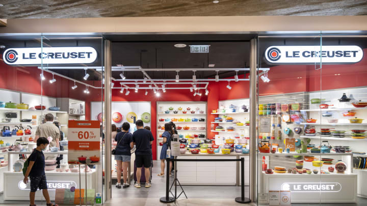 HONG KONG, CHINA – 2021/10/07: Shoppers are seen at the French cookware manufacturer brand Le Creuset store in Hong Kong’s Tung Chung district. (Photo by Budrul Chukrut/SOPA Images/LightRocket via Getty Images)