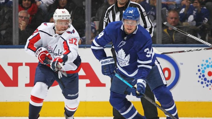 Evgeny Kuznetsov #92 of the Washington Capitals skates against Auston Matthews #34 of the Toronto Maple Leafs during an NHL game at Scotiabank Arena. (Photo by Claus Andersen/Getty Images)