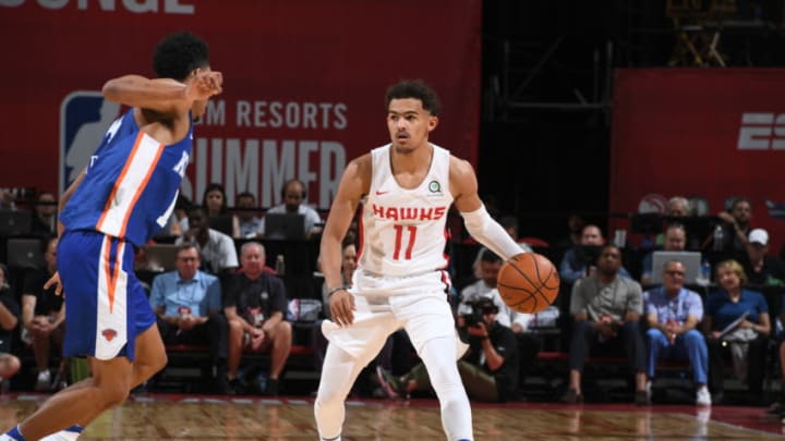 LAS VEGAS, NV - JULY 7: Trae Young #11 of the Atlanta Hawks handles the ball against the New York Knicks during the 2018 Las Vegas Summer League on July 7, 2018 at the Thomas & Mack Center in Las Vegas, Nevada. NOTE TO USER: User expressly acknowledges and agrees that, by downloading and/or using this Photograph, user is consenting to the terms and conditions of the Getty Images License Agreement. Mandatory Copyright Notice: Copyright 2018 NBAE (Photo by Garrett Ellwood/NBAE via Getty Images)