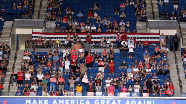 Supporters listen as U.S. President Donald Trump speaks in Tulsa, Oklahoma (Photo by Win McNamee/Getty Images)