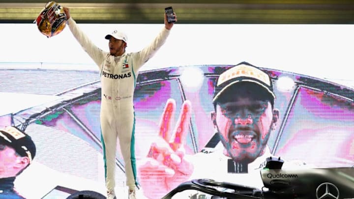 ABU DHABI, UNITED ARAB EMIRATES - NOVEMBER 25: Race winner Lewis Hamilton of Great Britain and Mercedes GP celebrates in parc ferme during the Abu Dhabi Formula One Grand Prix at Yas Marina Circuit on November 25, 2018 in Abu Dhabi, United Arab Emirates. (Photo by Mark Thompson/Getty Images)